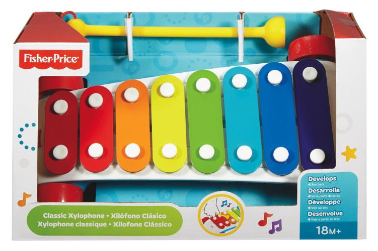 Xylophone classique de Fisher Price. 8 notes de couleur, un octave, dans l'emballage. Le bâton est attaché et le xylophone a des roues. 18 mois et +